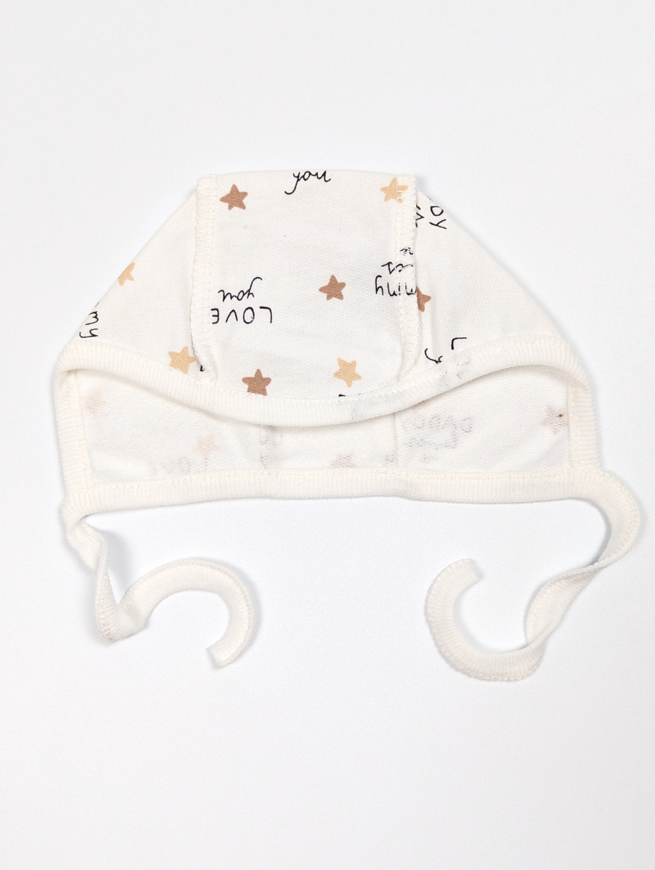 Чепчик молочний на завязках з зірочками, начіс